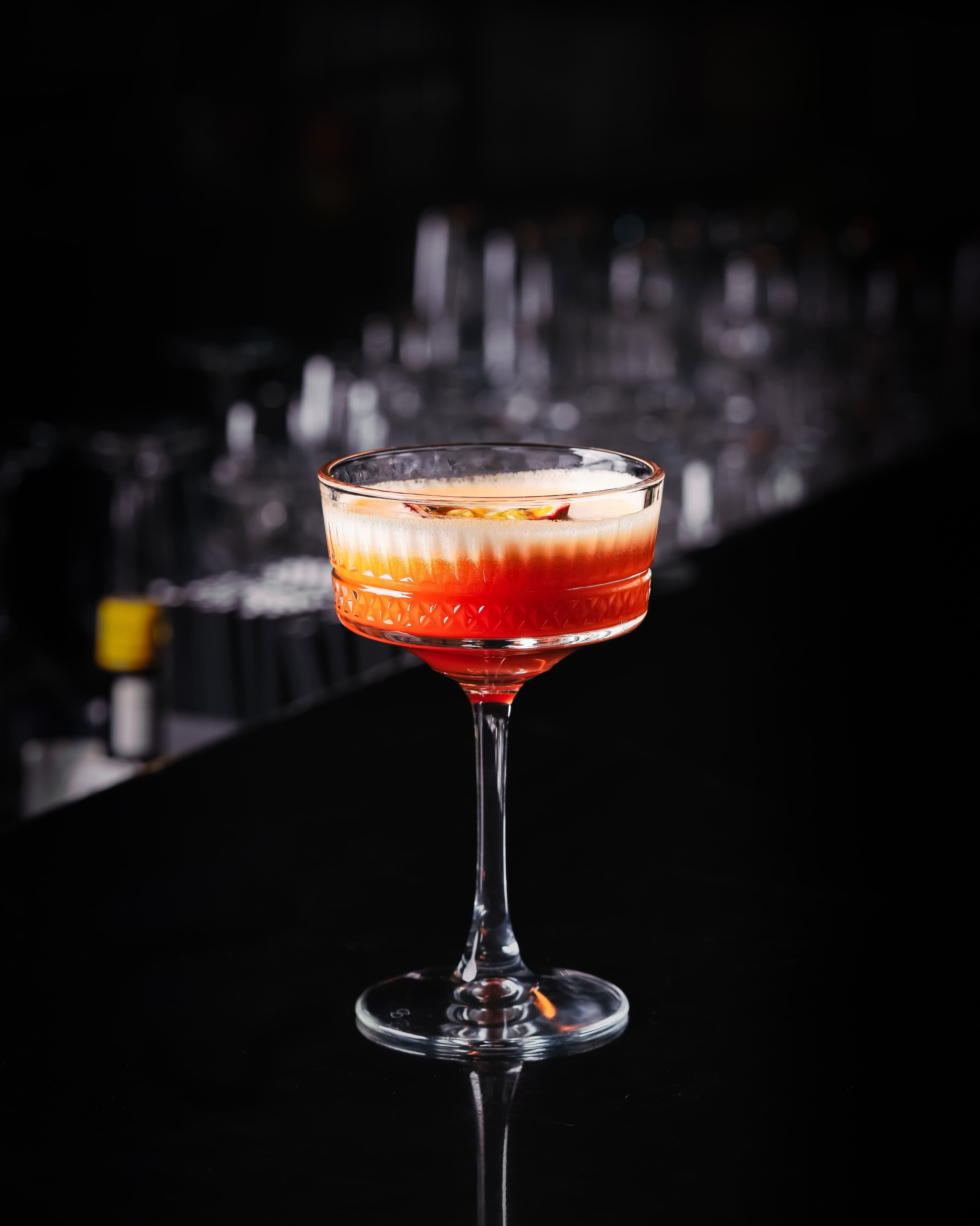 Dark plated dessert in studio light