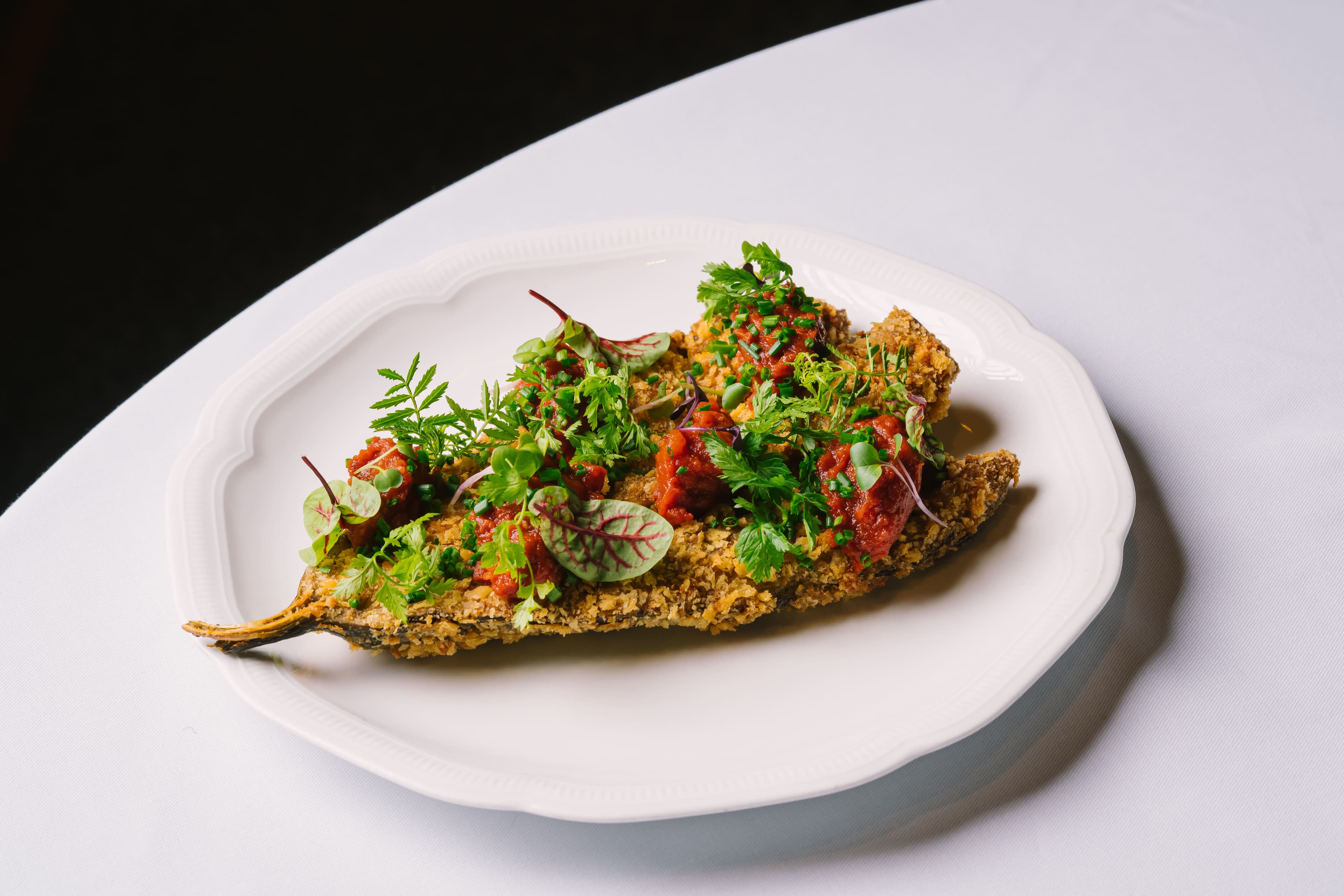 Roasted eggplant dish in editorial style